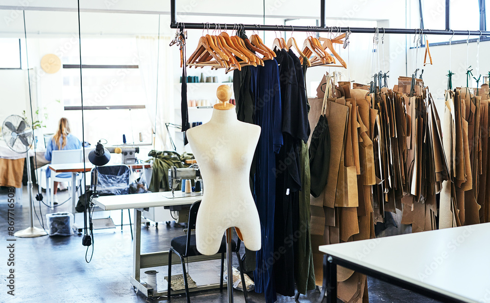 Textile, fashion designer and woman with mannequin, design studio and garments in atelier or small business. Female tailor, dressmaker and clothing rack for designs or couture with person in boutique Textile, fashion designer and woman with mannequin, design studio and garments in atelier or small business. Female tailor, dressmaker and clothing rack for designs or couture with person in boutique