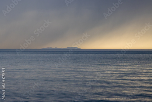 Calm sea and island Ereikousa, Greece