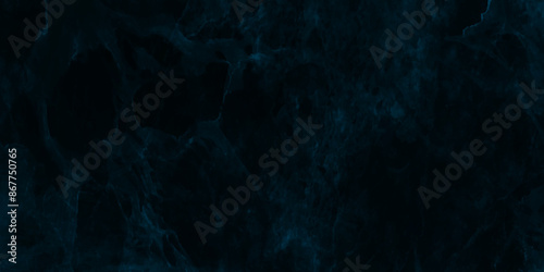 Abstract blue smoke on black background, old style dark blue grunge texture, grainy distress blue textured . brush painted blue background used in weeding card, cover, graphics design and web design.