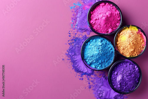 top view of colorful traditional holi powder in bowl