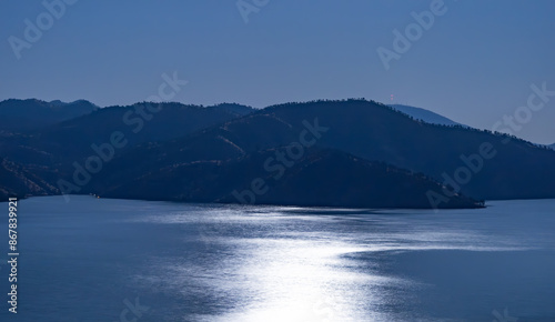 Fotografie moonlit lake and hills