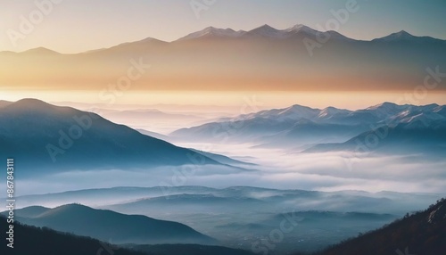mountain layers and sunrise view in cold and foggy weather.  © abu
