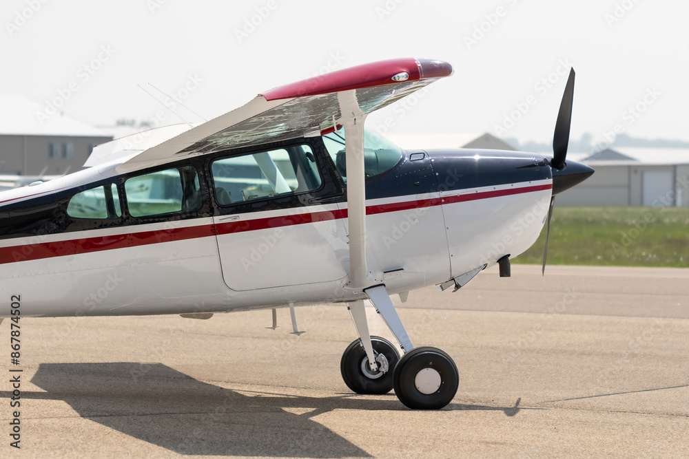 The real American Muscle. Sleek and sporty tailwheel aircraft. A classic bush plane with high wings and single engine propeller. Black white and red paint, ready for adventure The real American Muscle. Sleek and sporty tailwheel aircraft. A classic bush plane with high wings and single engine propeller. Black white and red paint, ready for adventure