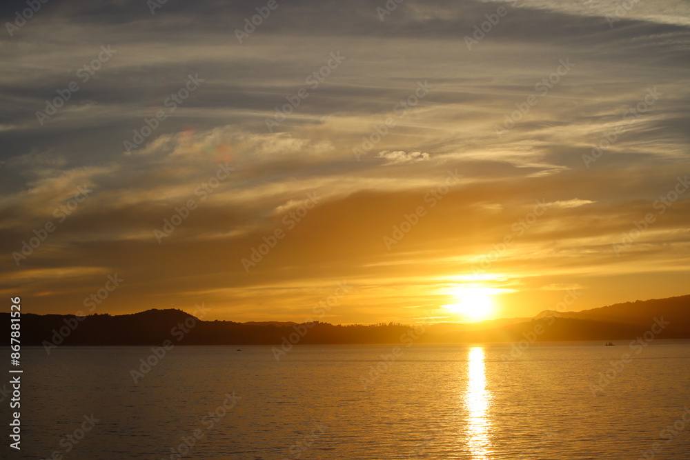 Sunset with dramatic sky over the sea.