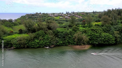 Aerial View of a Boat at Blackpot Beach, Kauai, Hawaii photo