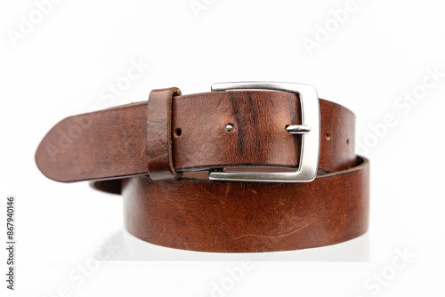 Real natural Leather belt. Leather brown belt on white background, vintage retro leather belt silver buckle