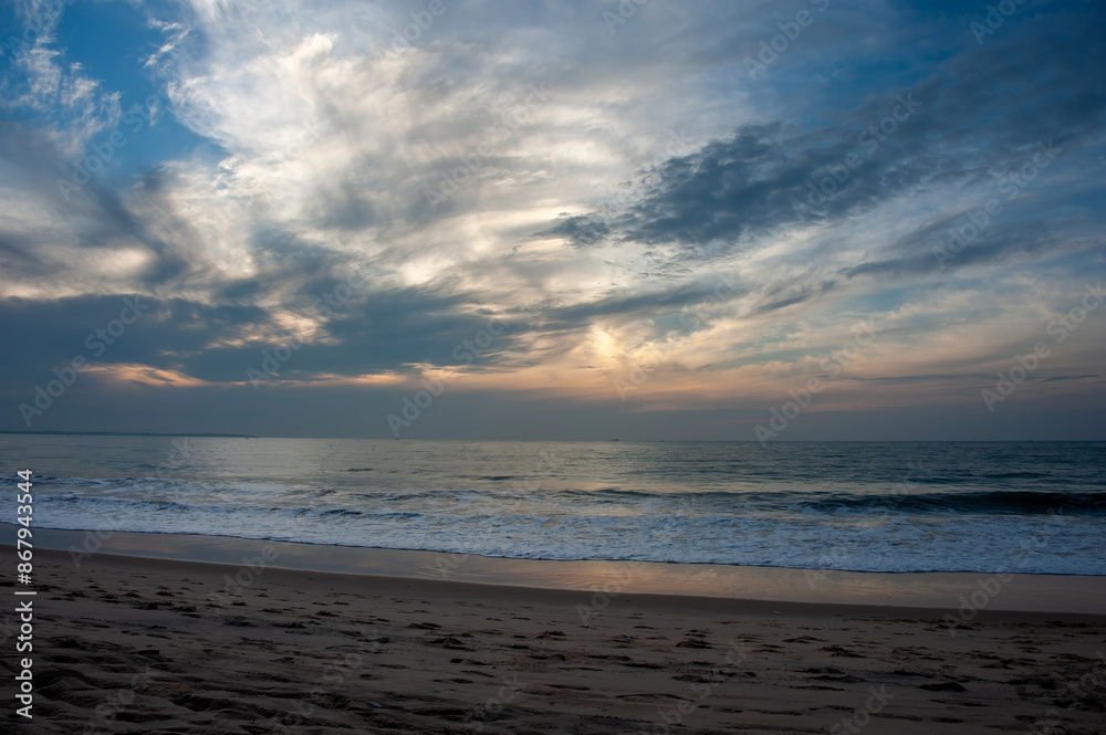 Ocean washing onto shore at Mui Ne Vietnam at sunrise famous surfing town Ocean washing onto shore at Mui Ne Vietnam at sunrise famous surfing town