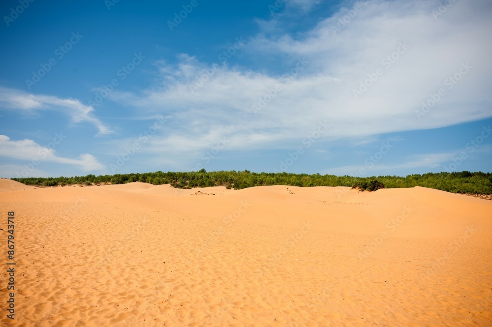 Red sand dunes Mui Ne Vietnam a popular tourist attraction for backpackers and holiday makers Red sand dunes Mui Ne Vietnam a popular tourist attraction for backpackers and holiday makers