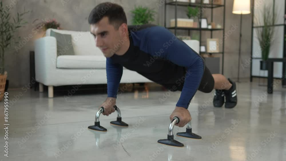 Young adult man push ups exercise at home