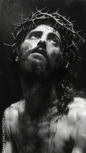 Christian figure looking at heaven in black and white