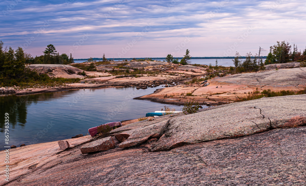 Canoe camping on one of the thousands of beautiful rocky islands on Georgian Bay in Lake Huron Canoe camping on one of the thousands of beautiful rocky islands on Georgian Bay in Lake Huron