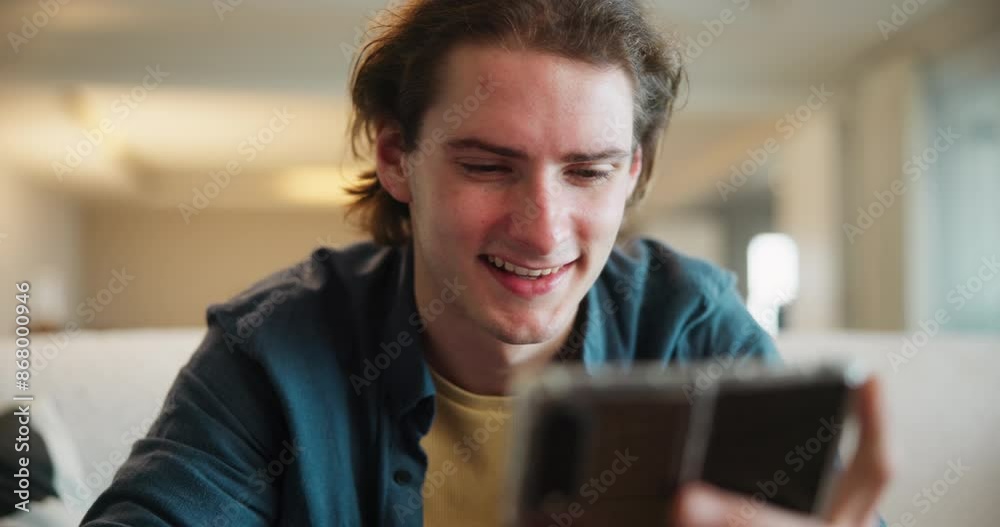 Man, phone and texting on sofa in home with smile, reading and click for notification in lounge. Person, smartphone and contact on mobile app for chat, relax and social media in living room at house Man, phone and texting on sofa in home with smile, reading and click for notification in lounge. Person, smartphone and contact on mobile app for chat, relax and social media in living room at house