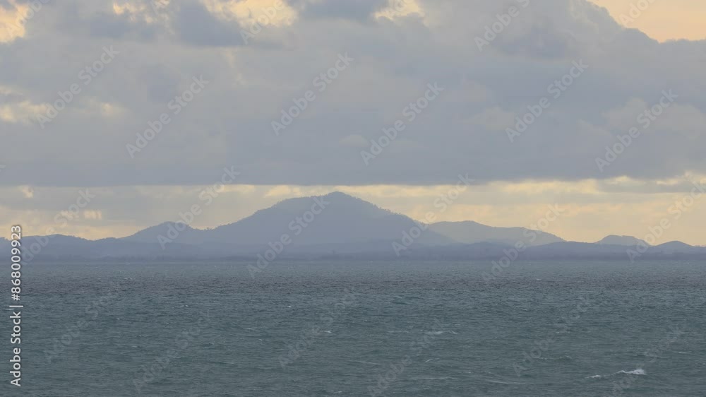 High angle video background with mountain scenery The river and the beautiful sunshine blurred onto the water surface in a golden light, the beauty of nature during the trip. High angle video background with mountain scenery The river and the beautiful sunshine blurred onto the water surface in a golden light, the beauty of nature during the trip.