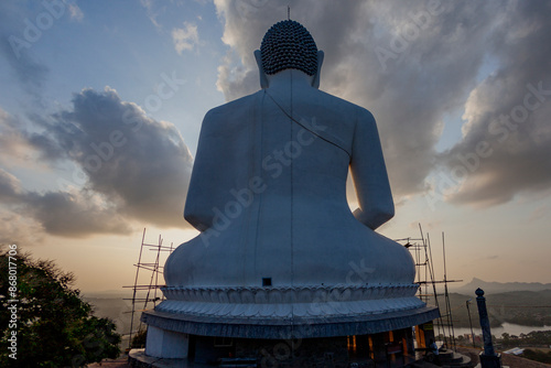 Back of a Buddha Statue at sunset, Kurunegala, Sri Lanka photo