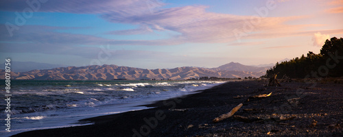 sunset over beautiful, rural rarangi beach, new zealand south island, marlborough region photo