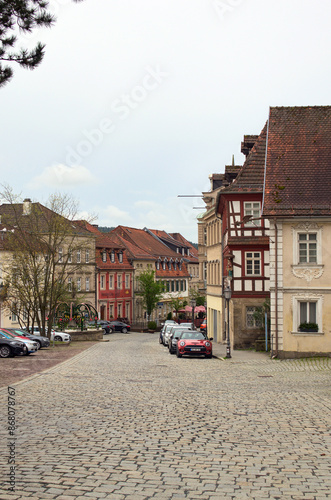 Kronach, Germany-April 10,2024:Picturesque landscape view of street with ancient houses under red tile in the old town of Kronach. Typical architecture in Bavaria, region Upper Franconia, Germany