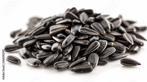 Pile of sunflower seeds on white background