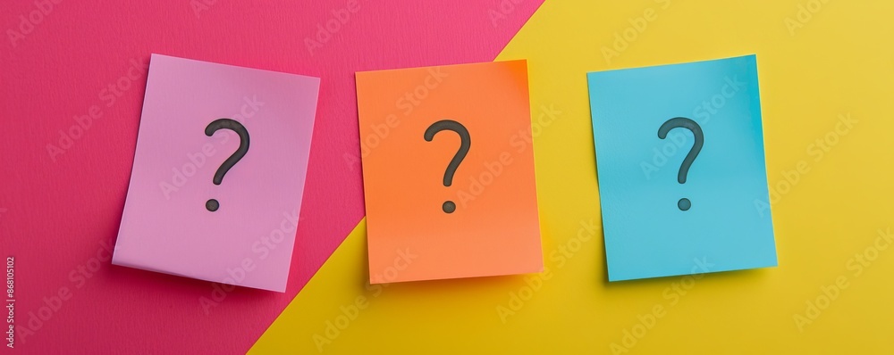 Colorful sticky notes with question marks on a vibrant background Colorful sticky notes with question marks on a vibrant background