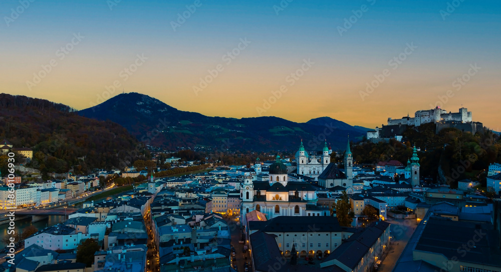Fototapeta premium The night city view with blue night sky with historic city of salzburg ,Austria