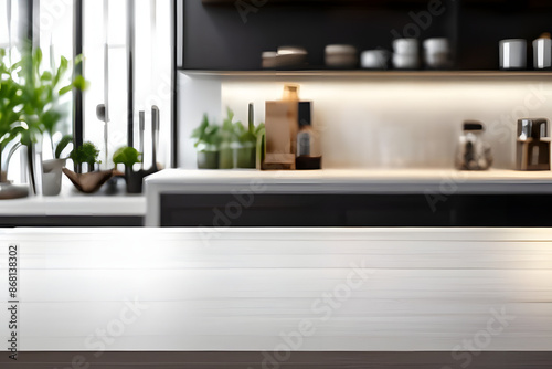 white table for display or product showcase with blurry modern kitchen background scene