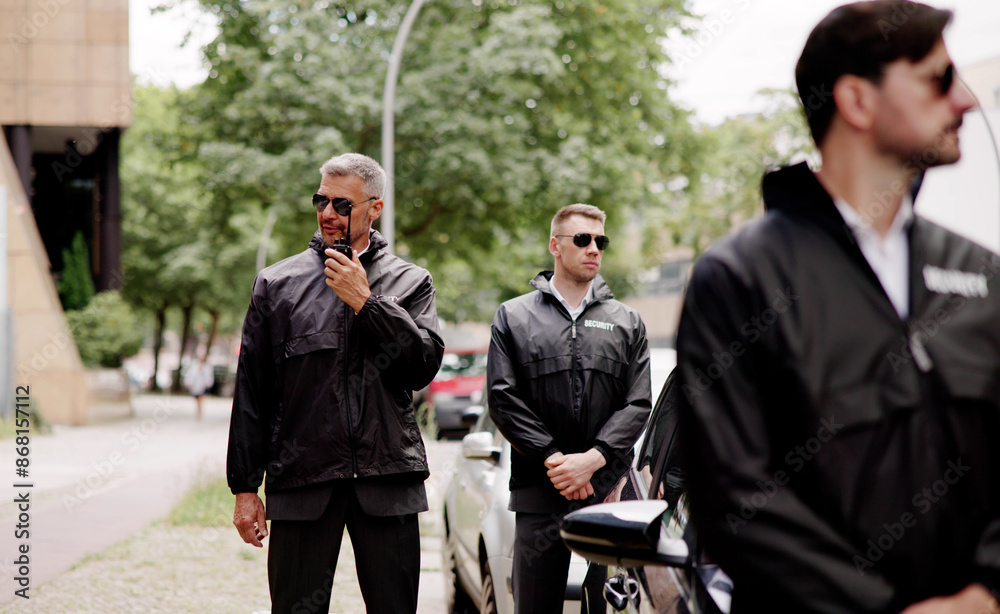 Experienced security agent secures high-end vehicle and passengers Experienced security agent secures high-end vehicle and passengers