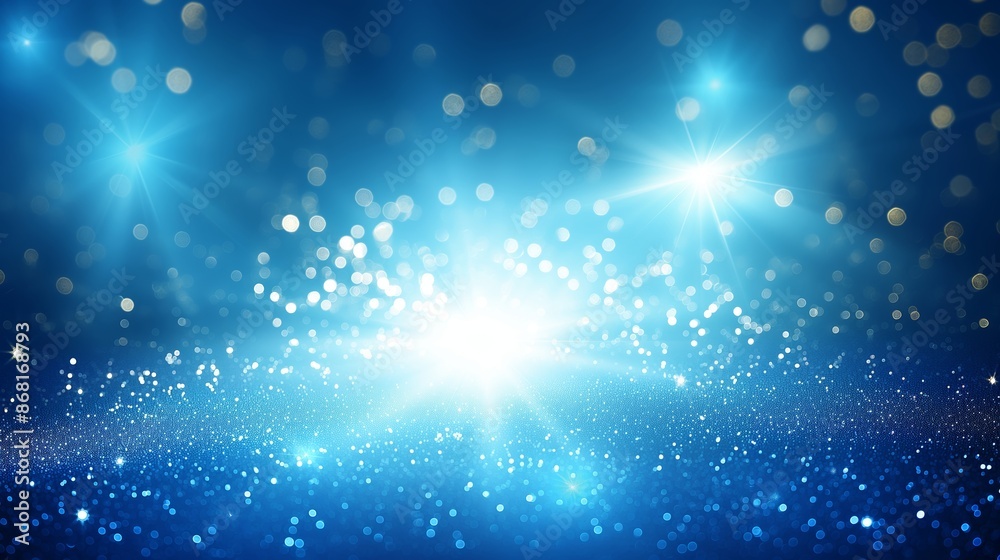 Naklejka premium Abstract blue background with defocused glittering lights and blurred circles