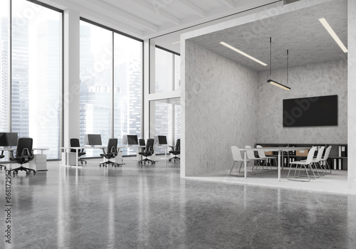 Modern open office space with a separate glass-walled meeting room, large windows, gray floor, and urban cityscape background. Office design concept. 3D Rendering photo