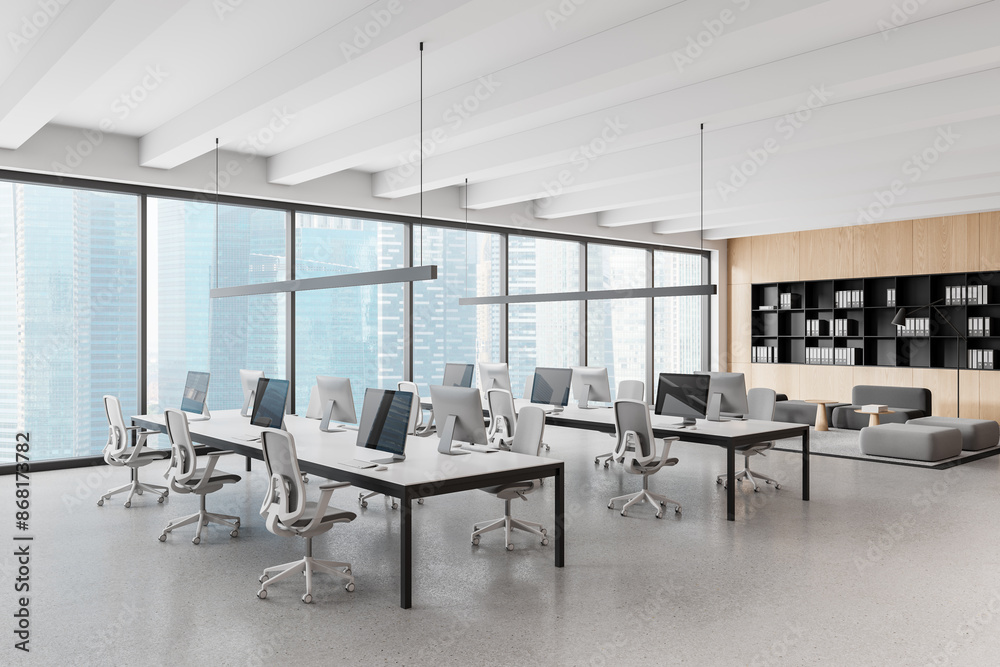 Office interior with coworking and lounge zone, shelf and panoramic window Office interior with coworking and lounge zone, shelf and panoramic window