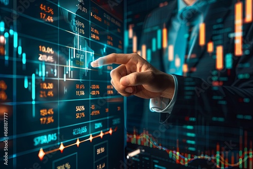 Businessman analyzing financial data and charts on digital screen. Concept of stock market, trading, investment, and finance technology.