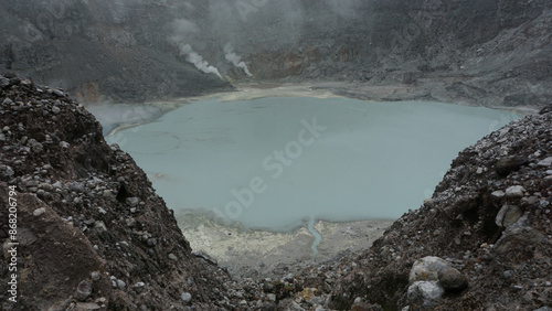 View of Sorikmarapi volcanic crater lake, North Sumatra, Indonesia. photo