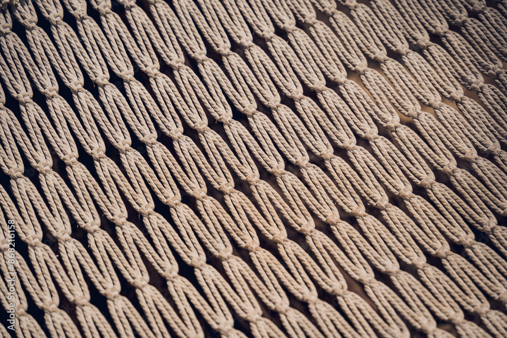 A detailed view of a knitted textile featuring a geometric design A detailed view of a knitted textile featuring a geometric design
