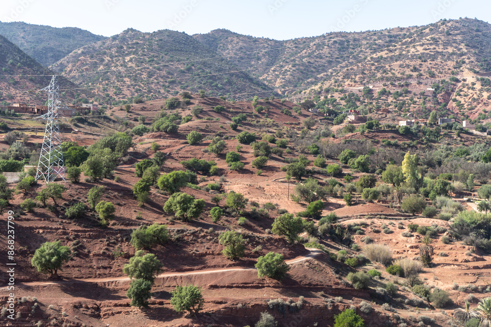 Morocco semi-deserts and mountains, north africa nature, Moroccan stone desert, red hills, villages and argan trees Morocco semi-deserts and mountains, north africa nature, Moroccan stone desert, red hills, villages and argan trees