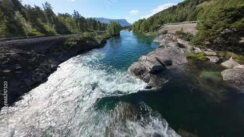 Norwegian mountain river flyover with drone