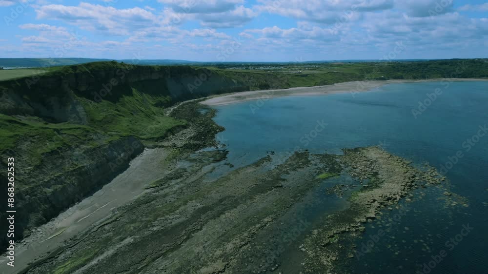 Cinematic aerial video of the cliffs at cayton bay Cinematic aerial video of the cliffs at cayton bay