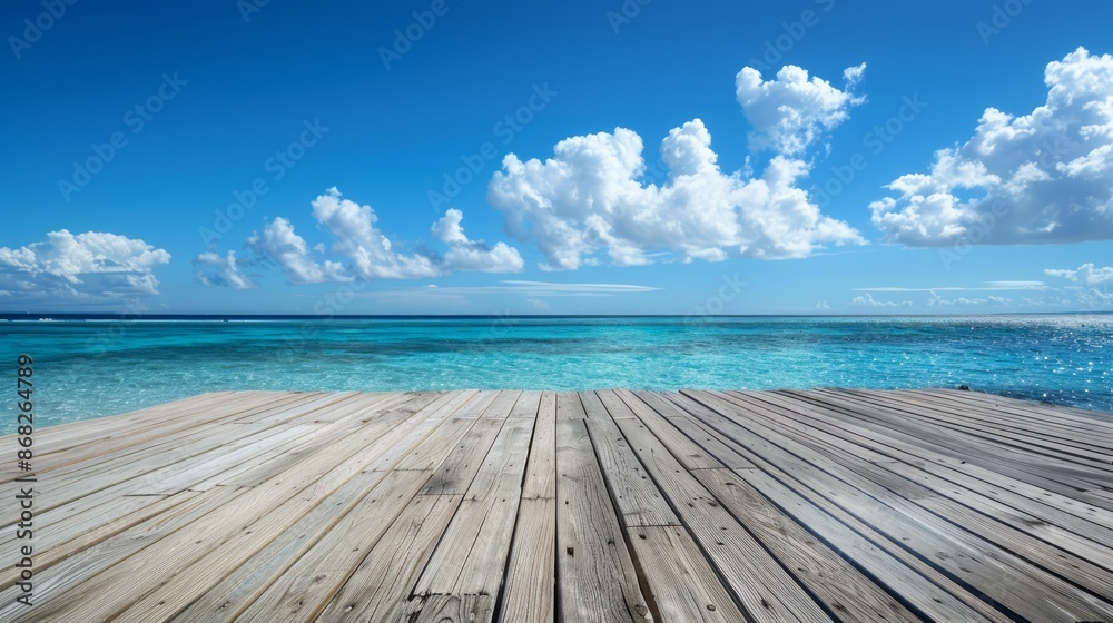 Fototapeta premium Wooden floor with blue sky and white clouds as background and clear sea with sunlight shining on it. Colorful colors.