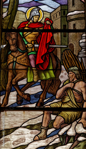 Saint Martin of Tours cuting a piece of his cloak for a beggar. Saint Martin de Tours coupant un morceau de son manteau pour un mendiant.