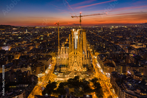 Nativity Facade of the Sagrada Família and Eixample in Barcelona during the evening twilight. (Catalonia, Spain)