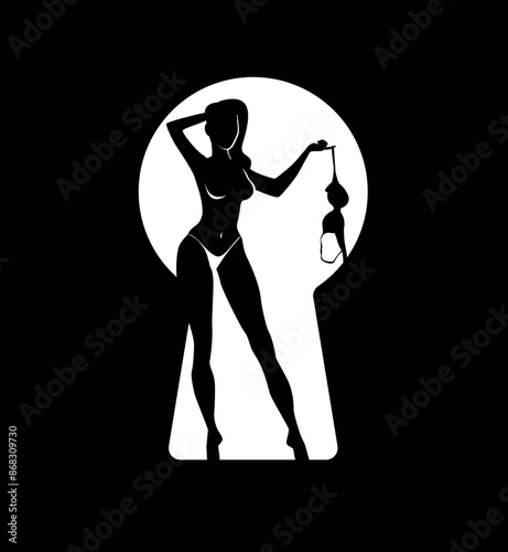  silhouette of a naked girl in a keyhole.