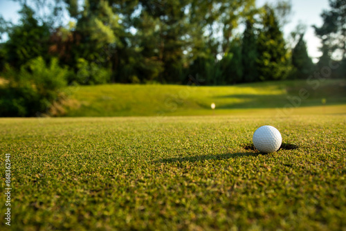 Golf course with ball and grass