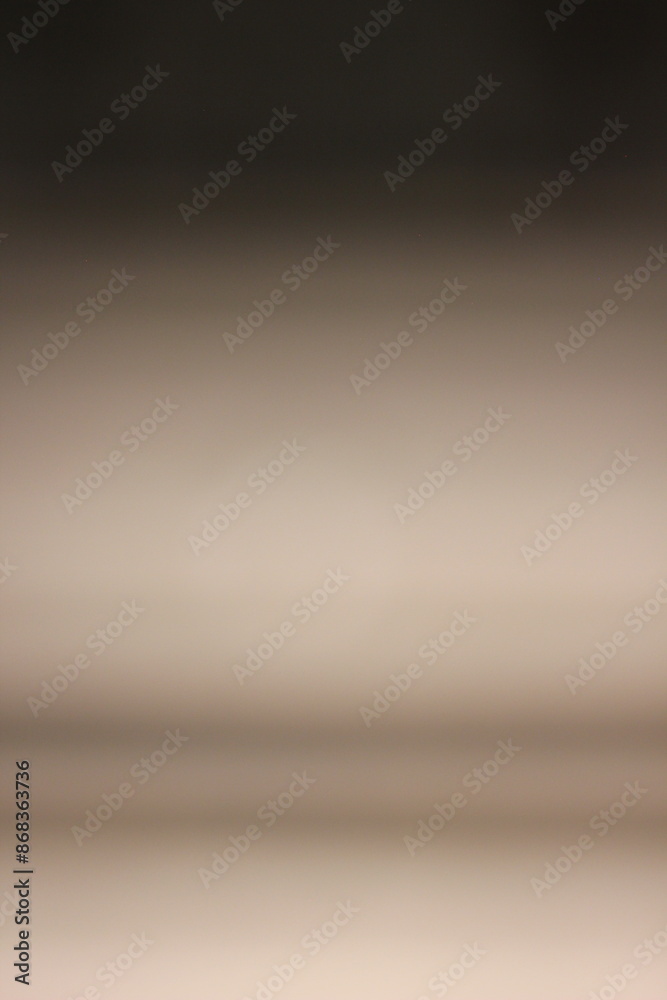 A blurry dreamy view of a gradient of brown to dark brown. A blurry dreamy view of a gradient of brown to dark brown.