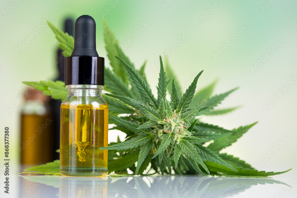 Bottles with hemp oil and cannabis leaves, marijuana Bottles with hemp oil and cannabis leaves, marijuana