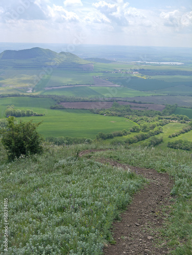 Ceske Stredohori hill range-Central Bohemian Uplands or Central Bohemian Highlands and protected landscape,aerial scenic panorama mountains view,Mila hill,Czech republic by Louny Town,Europe photo