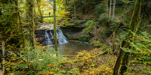 Waterfall river wieslauf with forest in Germany autumn photo