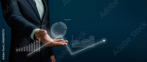 businessman presenting digital graphs with copy space