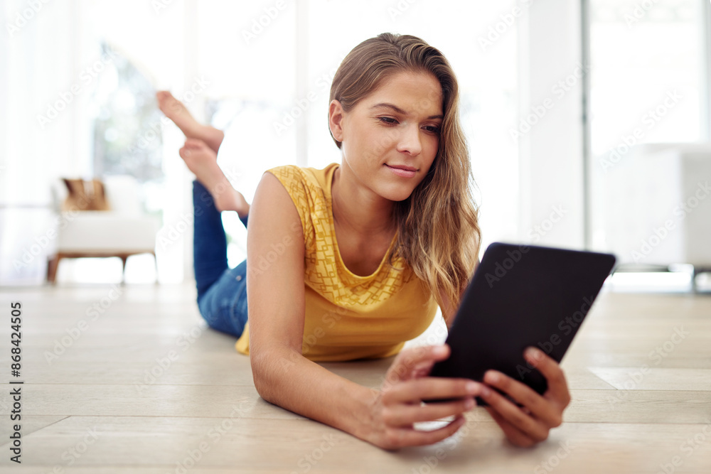 Woman, relax and tablet on floor in living room for online shopping, e commerce and internet browsing. Girl, technology and streaming on ground in home for ebook subscription, social media and apps. Woman, relax and tablet on floor in living room for online shopping, e commerce and internet browsing. Girl, technology and streaming on ground in home for ebook subscription, social media and apps.