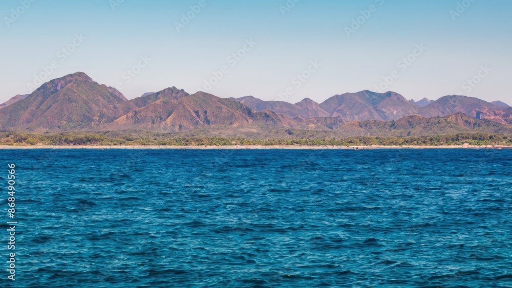 Landscape with mountains and blue ocean Landscape with mountains and blue ocean