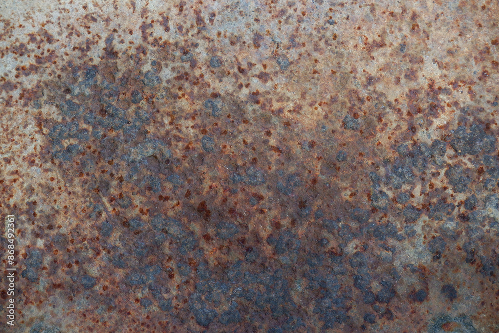 Rusty brown patterns spread across a rough surface, resembling an abstract artwork, reflecting the imperfect beauty found in the passage of time. Rusty brown patterns spread across a rough surface, resembling an abstract artwork, reflecting the imperfect beauty found in the passage of time.