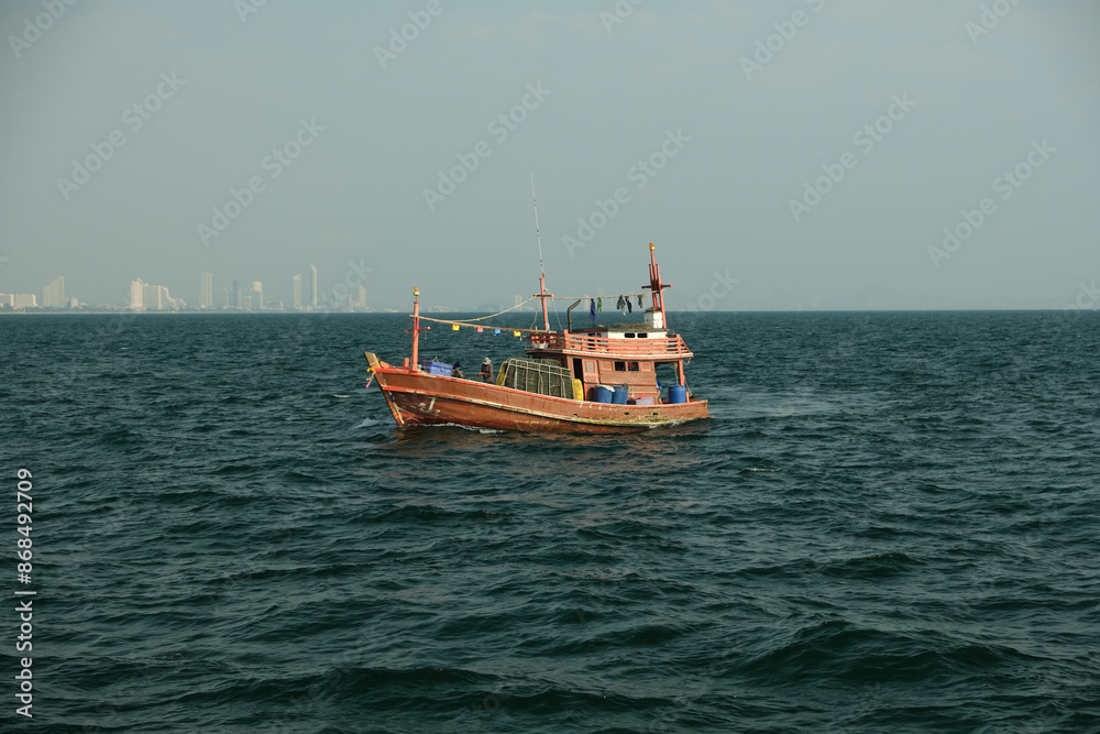 Fototapeta premium traditional thai fishing boat in the sea