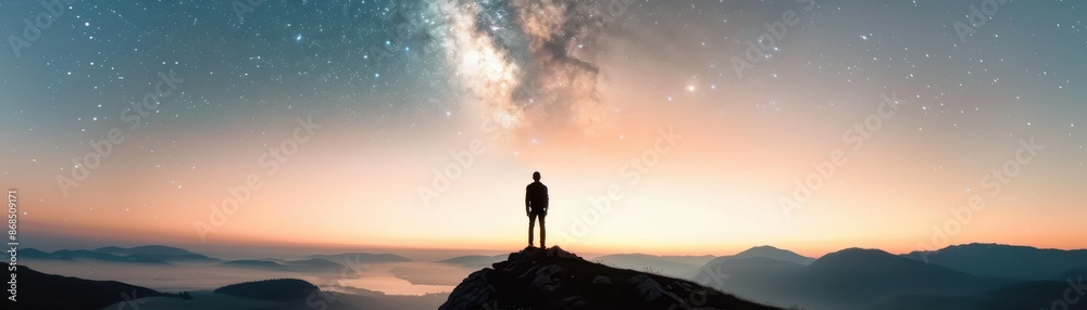 Person standing on a mountain peak under a starry sky, gazing at the Milky Way, with a breathtaking sunrise horizon. Person standing on a mountain peak under a starry sky, gazing at the Milky Way, with a breathtaking sunrise horizon.
