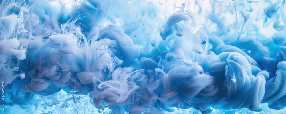 Light blue ink clouds in water, abstract background Light blue ink clouds in water, abstract background